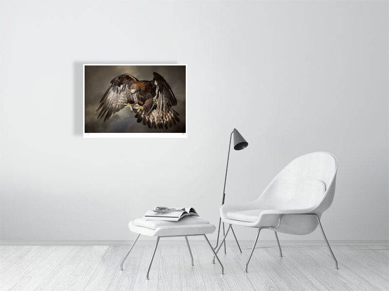 A Golden Eagle in swooping against a dramatic sky by photographer Tim Platt available online from Tim Platt Fine Art Photography Prints